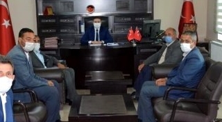 Güroymak Kaymakamı Zeyrek Muhtarları makamında kabul etti